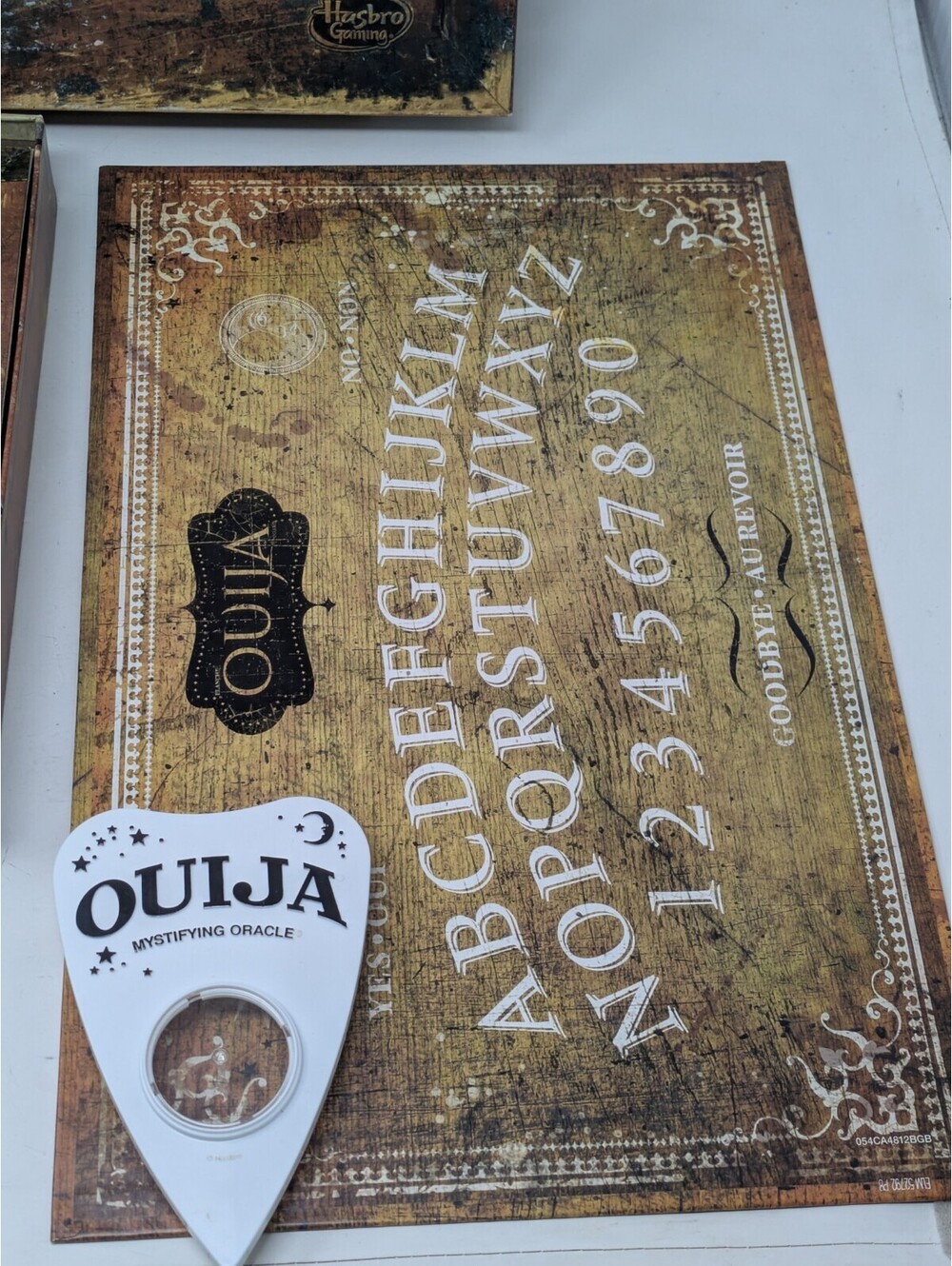 Ouija Board The Mystifying Oracle Game Hasbro with Planchette 2015 - Picture 2 of 5